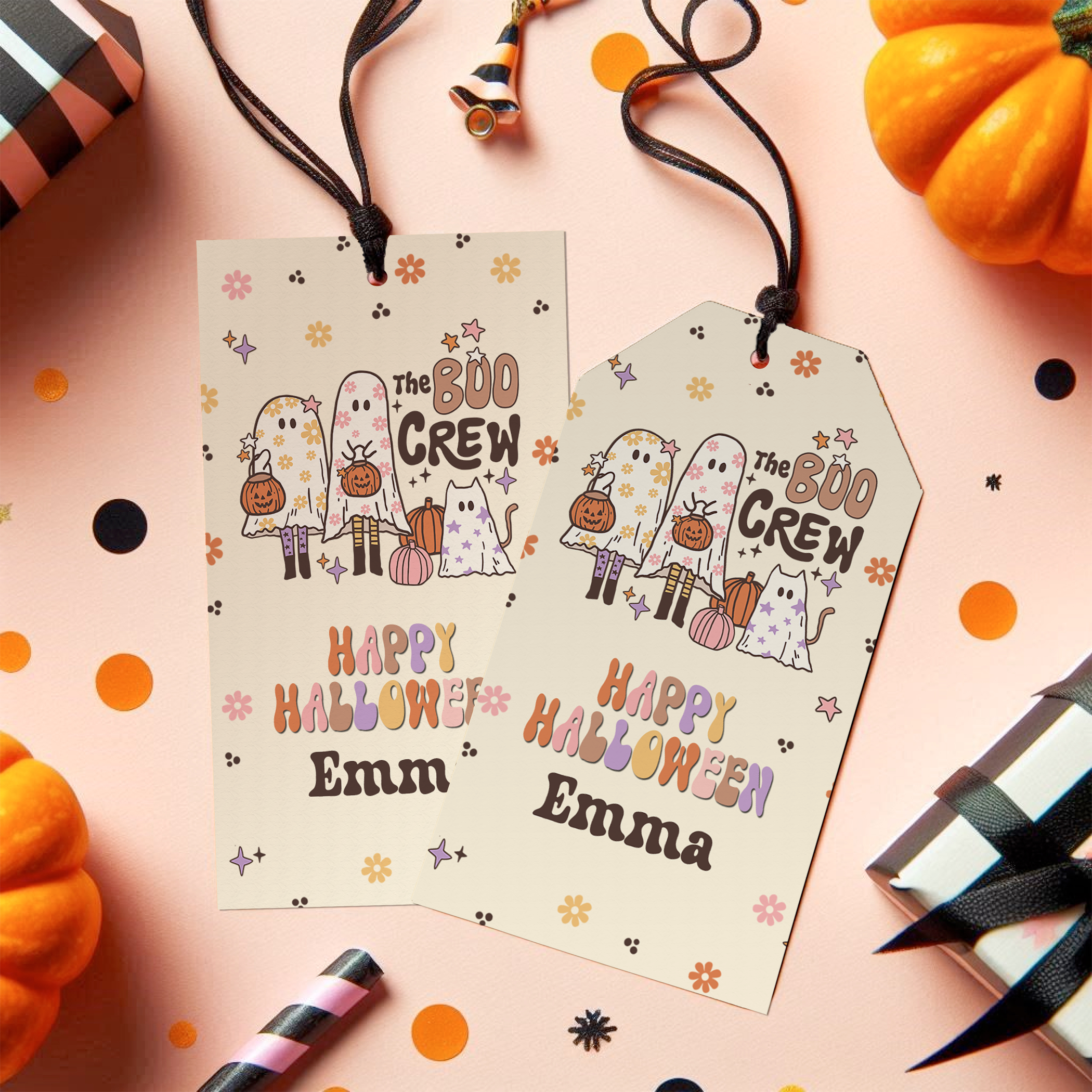 Two Halloween-themed gift tags with 'The Boo Crew' design on a pink background with pumpkins and ribbons.