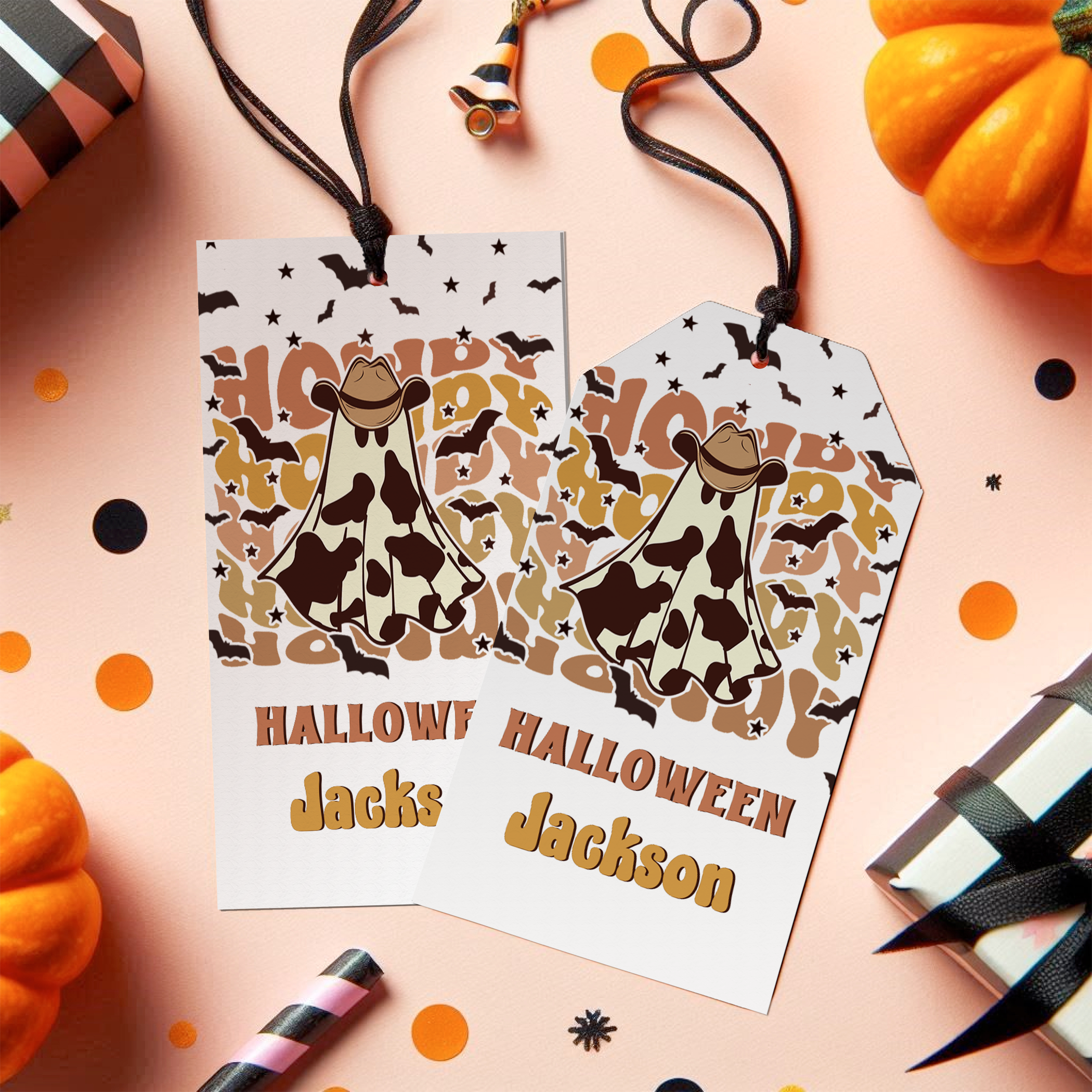 Two Halloween-themed gift tags with cow design and personalized text on a festive background.