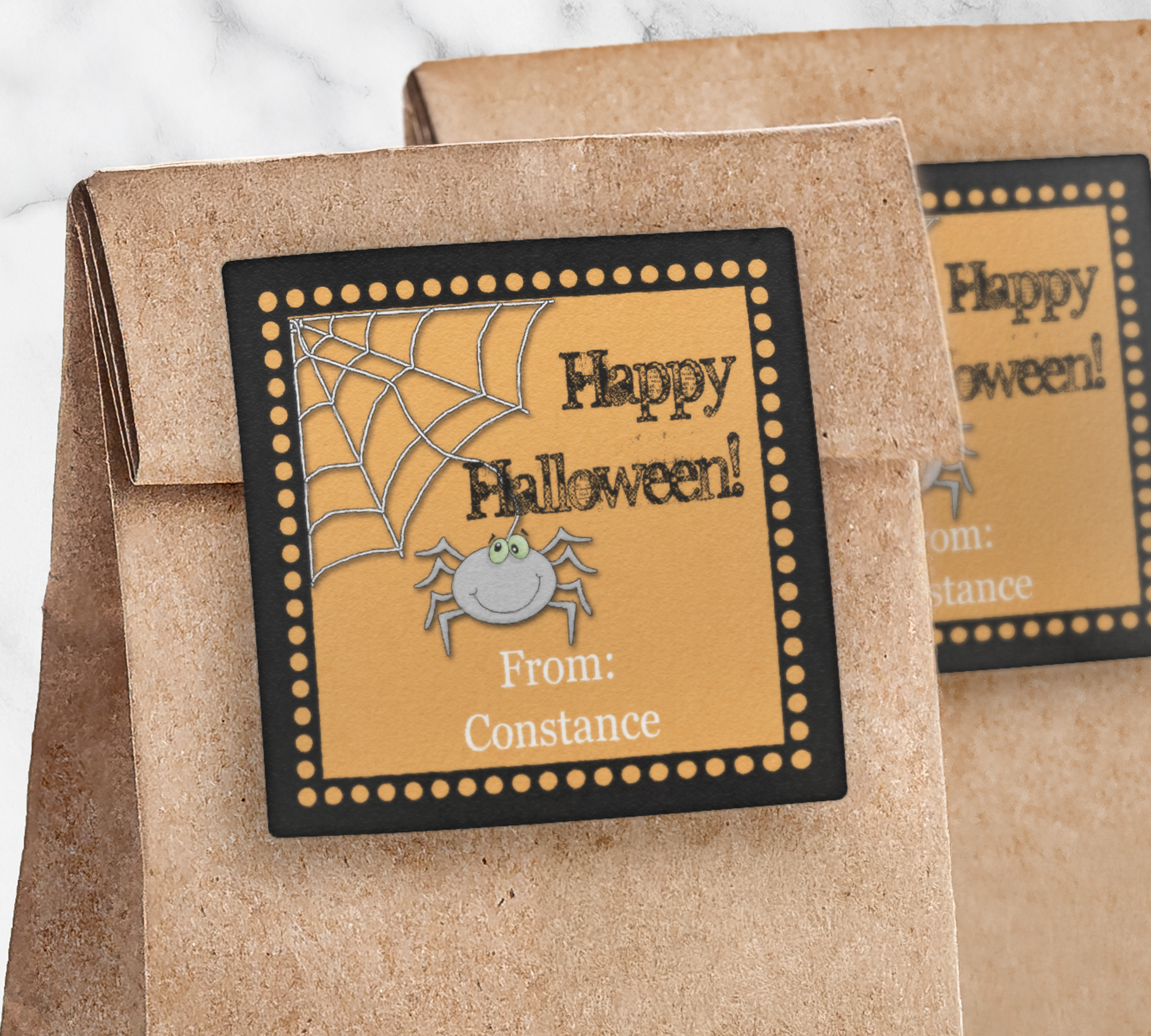 Spider Web Halloween Square Sticker on a brown paper bag